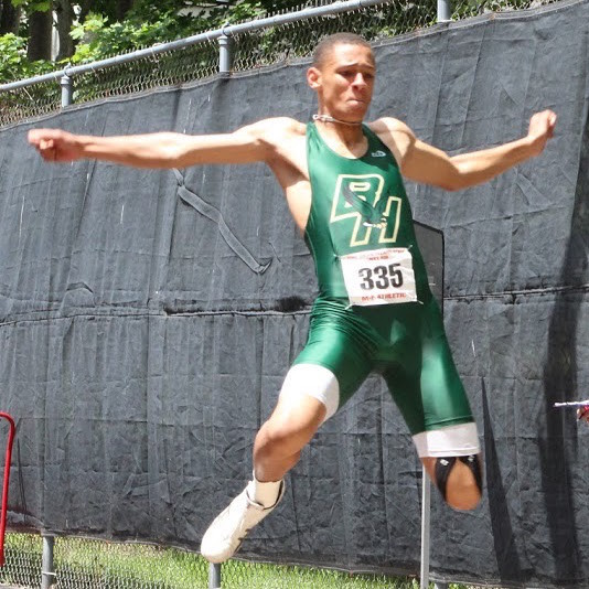 GAUGING THE JUMP: Hendricken's Joseph Rivera Santos was in action during the boys' long jump event at the outdoor state meet last weekend.
