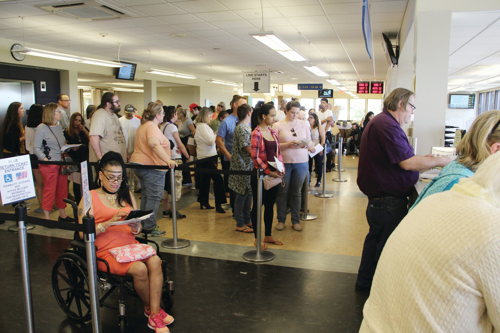 THE DMV EXPERIENCE: The wait at the main branch of the DMV in Cranston was about 90 minutes Friday. The branch completes about 17,000 transactions monthly, which should happen faster as a new computer system comes online starting July 5.