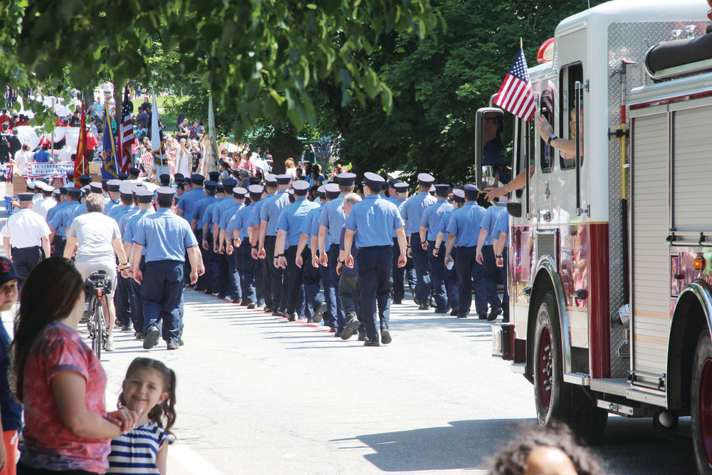 LONG BLUE LINE: Warwick firefighters turned out in numbers to represent the city.