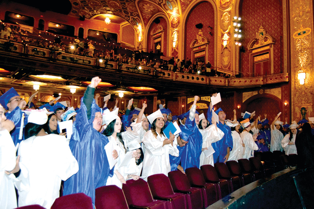 PANTHERS ROAR: Johnston seniors celebrate after receiving their diplomas at graduation on Friday at the Providence Performing Arts Center.