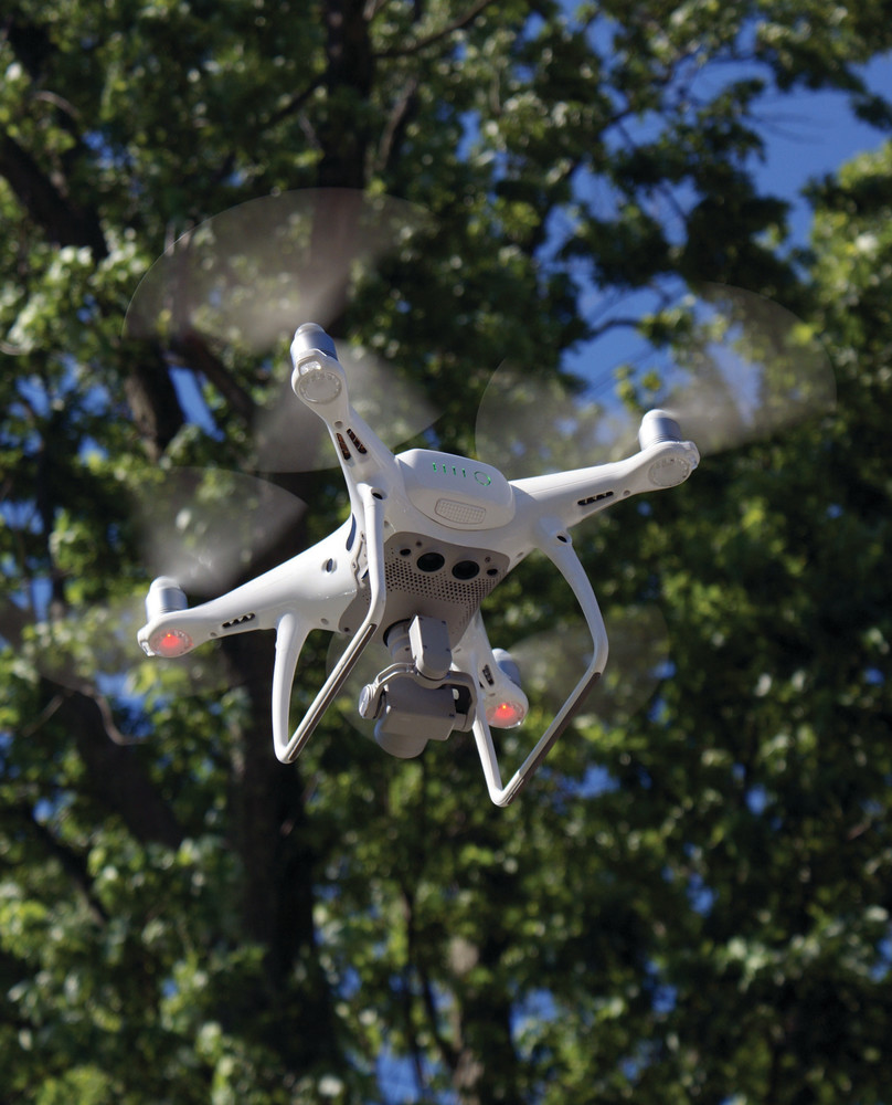 IN FLIGHT: Pictured is a Drone, owned by Cloud City Drones in Warwick, which was in flight after a presentation by Chris Williams at the William Hall Library. The presentation was the first event of the Teen Summer Program at the Cranston Public Libraries.