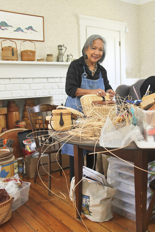 Helen Lee at work on her iconic handbags