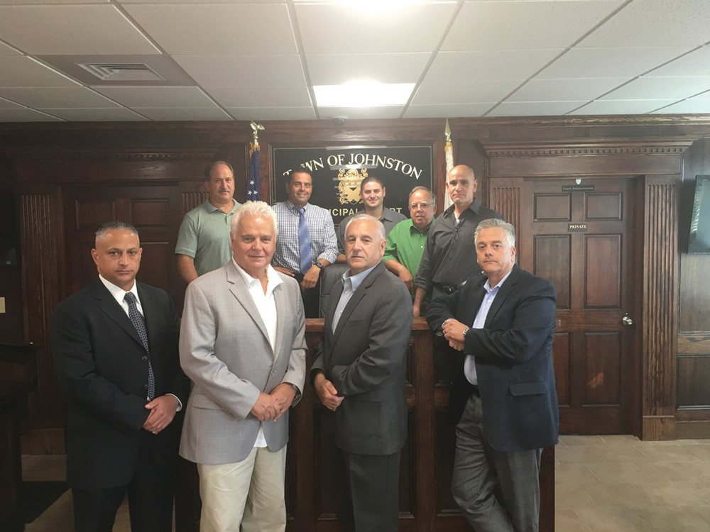 CONTRACT AGREEMENT REACHED: Last Wednesday, the Johnston Town Council unanimously approved a five year contract with the union representing members at the Johnston Police Department. Picture from left, back row are Councilmen Robert Civetti, Robert Russo, Richard DelFino, David Santilli and Anthony Verardo. Front row from left are President of the IBPO Local 307 Michael Andreozzi, Police Chief Richard S. Tamburini, Mayor Joseph Polisena, and Chief of Staff Doug Jeffrey.