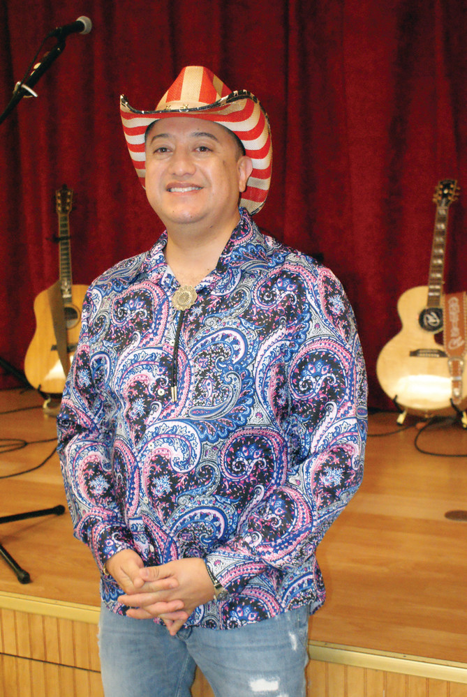 YEEHAW: Pictured is RSVP Director David Quiroa dressed for Country Night at the senior center.