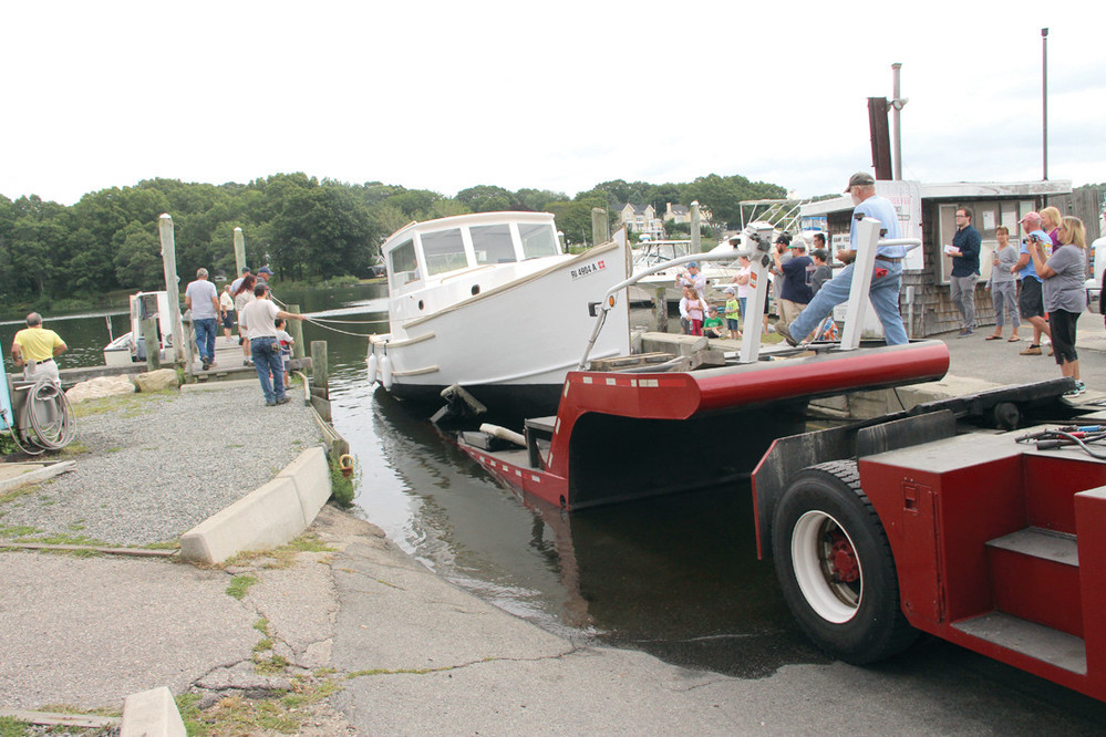 BACK IT UP: The &ldquo;Anna Vee&rdquo; is backed into the water to be launched.