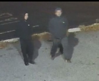 Two male suspects in the theft-stabbing at Town Wine &amp; Spirits as captured by security cameras at the business Saturday evening, Dec. 2.