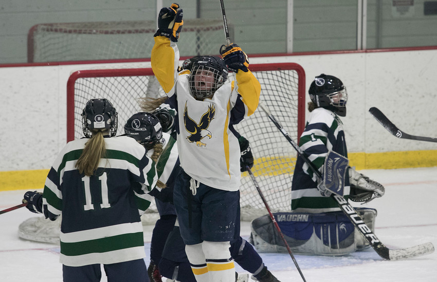 East Bay senior forward Mary Arkins celebrates after tying the game 2-2 in the third period.