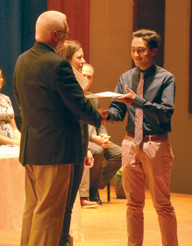 IT&rsquo;S AN HONOR: Johnston junior Alexander Tum was one of more than 80 students recognized at last week&rsquo;s National Honor Society Induction Ceremony.