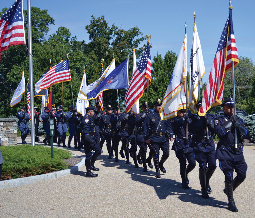 MARCHING OUT: The Honor Guard, comprised of members of several departments including Providence and Cranston, recessed as Monday&rsquo;s ceremony came to a close.