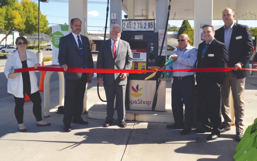 THE MARKET OF REDUCING CARBON: From left to right, GreenPrint strategic account manager Morgan Holmes, Johnston District 5 Town Councilman Robert Civetti, Northern Rhode Island Chamber of Commerce Vice President Paul Ouellette, Stop &amp; Shop fuel specialist Ken Silvia, Johnston store manager Mike Clodi and district manager Scott Danis cut the ribbon Stop &amp; Shop&rsquo;s Restore program during a ceremony Wednesday morning at the Stop &amp; Shop at 11 Commerce Way in Johnston.