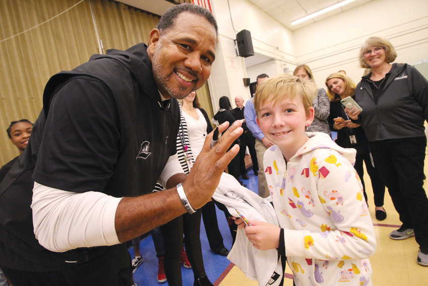 HE COULDN&rsquo;T MISS HER: There was no question that Norwood second grader Bryna Lemonde is a Friars fan. She had drawn a PC on her cheek and Coach Cooley quickly picked her out of the crowd. They tried to place a surprise call to her father, but he could be reached and they were unable to leave a voice mail.