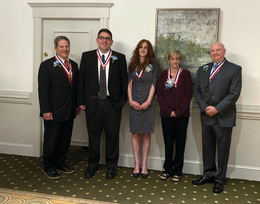 HALL OF FAMERS: The members of the Cranston Hall of Fame&rsquo;s class of 2019 gather together following Friday&rsquo;s dinner. Pictured, from left, are Steven Maurano, David Schiappa, Dawn Piechocki &ndash; who represented her late father, Leonard D&rsquo;Errico &ndash; Meri Kennedy and Michael Chalek.