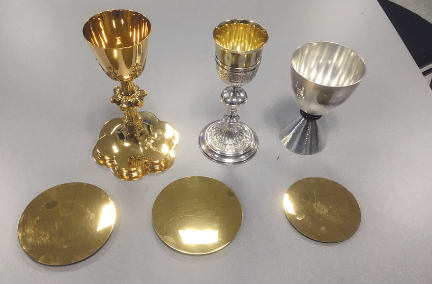 SAFE AND SECURE: These are three of the chalices recovered by the Johnston Police Department following the Oct. 22 theft at St. Rocco&rsquo;s Church. One chalice had been pieced out. The estimated combined value of the chalices was about $10,000.