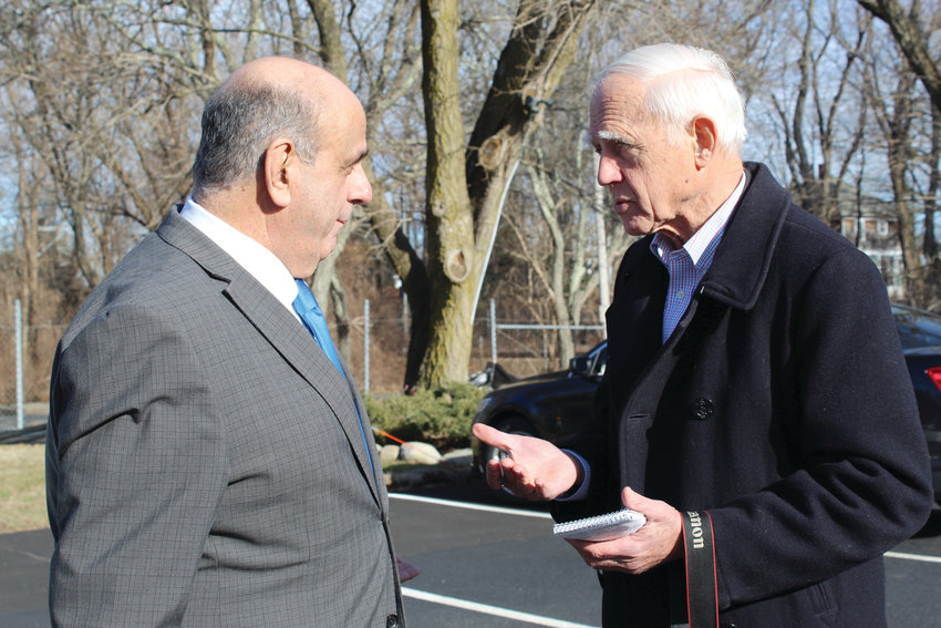 ON THE BEAT: Warwick Beacon publisher and editor John Howell, right, interviews Warwick Mayor Joseph Solomon on Tuesday at Warwick City Hall. Howell, who also publishes the Cranston Herald, Johnston SunRise and Reminder, purchased the Beacon in late 1969.