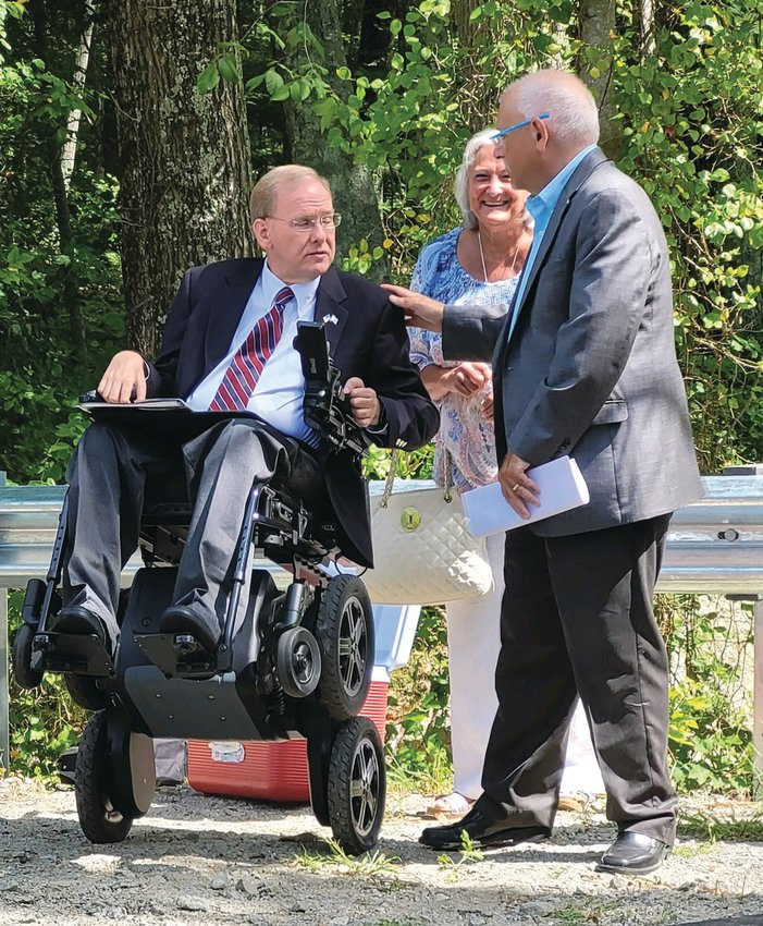 LOCAL &amp; FEDERAL: In August, Johnston Mayor Joseph M. Polisena shakes hands with U.S. Rep. James Langevin  at an event on Belfield Drive touting floodplain improvements in Johnston, aided by the USDA, in a cooperative  effort with town and state officials.