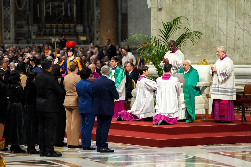 Pope Francis installs 40 lay men and women from 11 countries, including Albania, Argentina, Brazil, and the Philippines, to the ministry of lector during Mass celebrating Sunday of the Word of God and the final day of the Jubilee of the World of Communications in St. Peter’s Basilica at the Vatican Jan. 26, 2025. The ministry of lector was formally opened to women by the pope in 2021. (CNS photo/Lola Gomez)