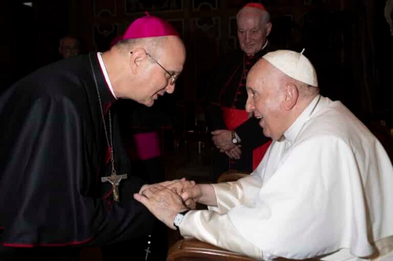 Bishop Bruce A. Lewandowski, C.Ss.R., greets Pope Francis during a meeting with new bishops at the Vatican Sept. 8, 2022.