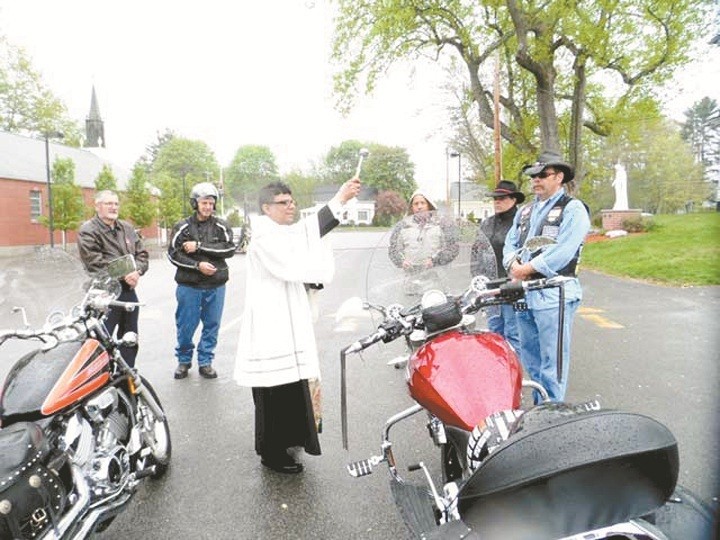 ASKING FOR DIVINE PROTECTION: In spite of a rainy day, the annual blessing of motorcycles took place on May 11 at St. Eugene Parish, Chepachet, where the pastor, Father TJ Varghese offered prayers and blessings on the motorcycles and the riders attending. The Blessing of the Bikes is a unique and prayerful time to ask the Lord for help. During this Year of Faith, the blessing also serves as a significant reminder for Catholic motorcycle enthusiasts to put their trust in God, and ask that he watch over them in their travels. By asking for God&rsquo;s divine protection for another year of safe riding, Catholics are drawn more deeply into their faith as they seek to strengthen their relationship with the Father.