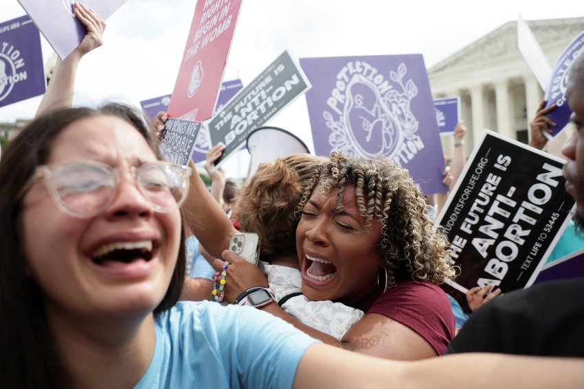 Pro-life demonstrators in Washington celebrate outside the Supreme Court June 24, 2022, as the court overruled the landmark Roe v. Wade abortion decision.