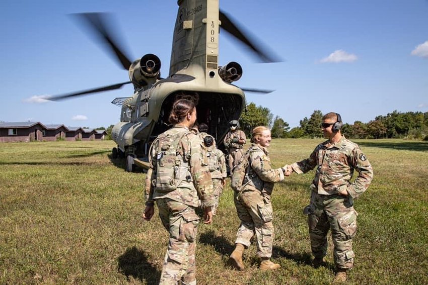 In his previous assignment as a U.S. Army chaplain at Fort Leonard Wood, Missouri, Father Luke Willenberg wishes a group of female soldiers in Basic Training Godspeed as they climb aboard a Chinook helicopter&nbsp;for a flight.