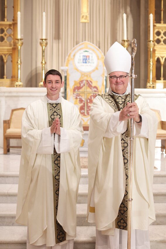 Father Patrick Ryan smiles with Bishop Richard G. Henning on his ordination day, June 24, 2023.