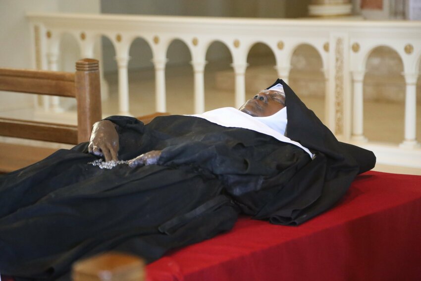 The exhumed body of Sister Mary Wilhelmina Lancaster, foundress of the Benedictines of Mary, Queen of Apostles, lies in repose in the church at the Abbey of Our Lady of Ephesus in Gower, Mo., May 21, 2023.