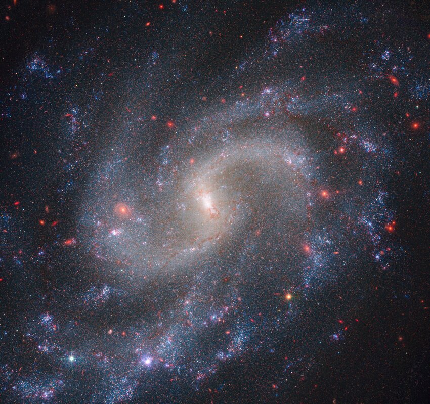 Combined observations from the Webb telescope's near-infrared camera and Hubble's wide field camera 3 show spiral galaxy NGC 5584, which resides 72 million light-years away from Earth.