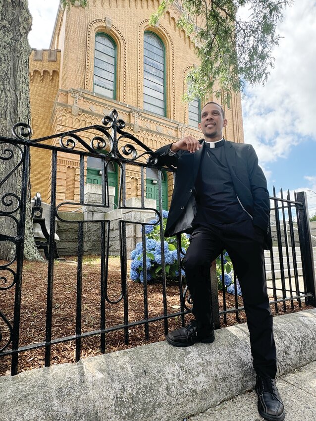 Rev. Mr. Jairon Olmos-Rivera smiles outside of St. Charles Borromeo Church, Providence. On Saturday, June 29, at 10 a.m., Bishop Richard G. Henning will celebrate Holy Mass with the ordination of Deacon Joseph and Deacon Jairon to the Sacred Priesthood.