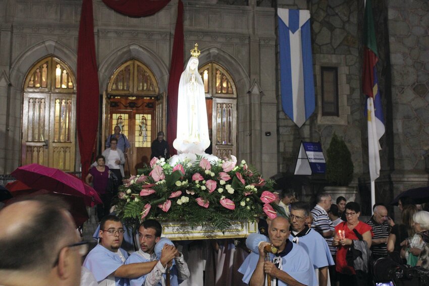 Portuguese Cultural tradition: Parishioners of Our Lady of the Rosary Catholic Church in Providence gather together to participate in the celebrations surrounding their parochial feast.