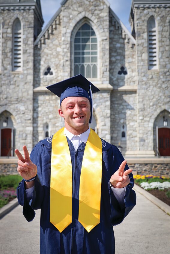 Stephen Baker, pictured at his graduation from Villanova University, has become the first student in the Brother Thomas Leto Options Program at Bishop Hendricken to graduate from a Catholic college or university.