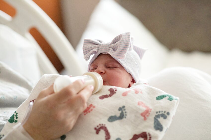 A mother feeds her newborn child, after giving birth in the Family Birth Center at Beaumont Hospital in Royal Oak, Mich., Feb. 1, 2022. Vice President Kamala Harris has suggested a robust increase in the child tax credit, while Ohio Sen. JD Vance has floated a similar proposal; some pro-life leaders say the initiatives, if passed by Congress, could help reduce poverty and aid some low-income parents in choosing life.