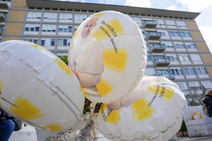 Balloons featuring an image of Pope Francis are seen outside Rome&rsquo;s Gemelli hospital Feb. 27, 2025, where the pope is being treated for double pneumonia.