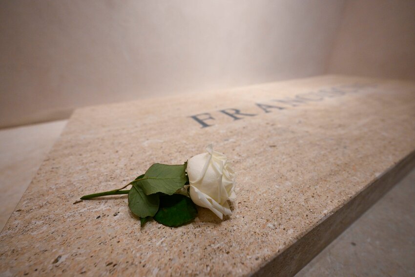 A single white rose sits on the tomb of Pope Francis in Rome's Basilica of St. Mary Major early April 27, 2025.
