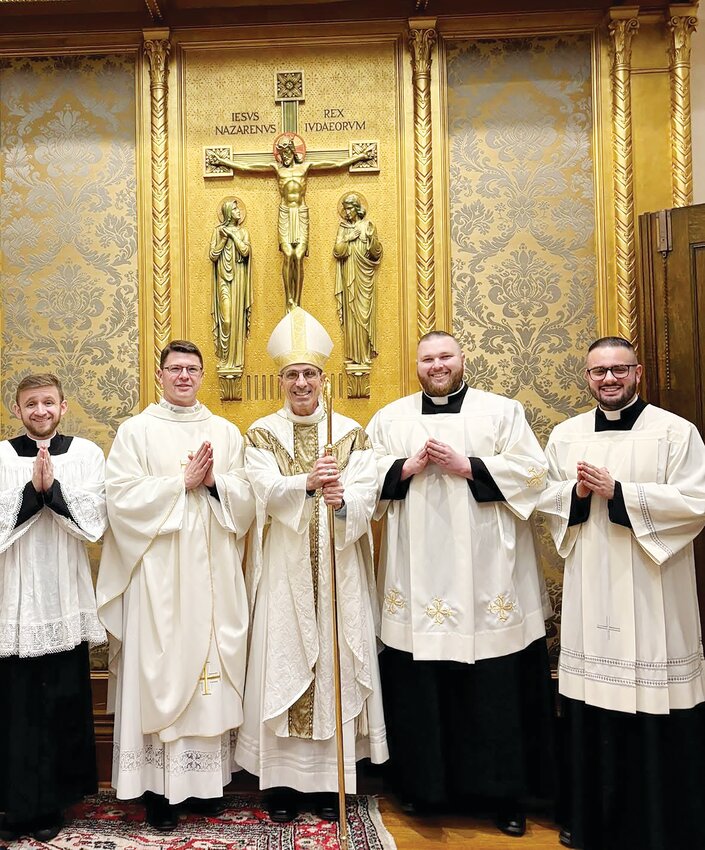 Diocese of Providence group of seminarians, with Most Rev. James T. Ruggieri, Bishop of Portland, Maine. Pictured from left, Nicholas Jones, Father Ryan W. Connors,  Seminary of Our Lady of Providence rector; Bishop Ruggieri; Adam Habershaw, and David Bardales.