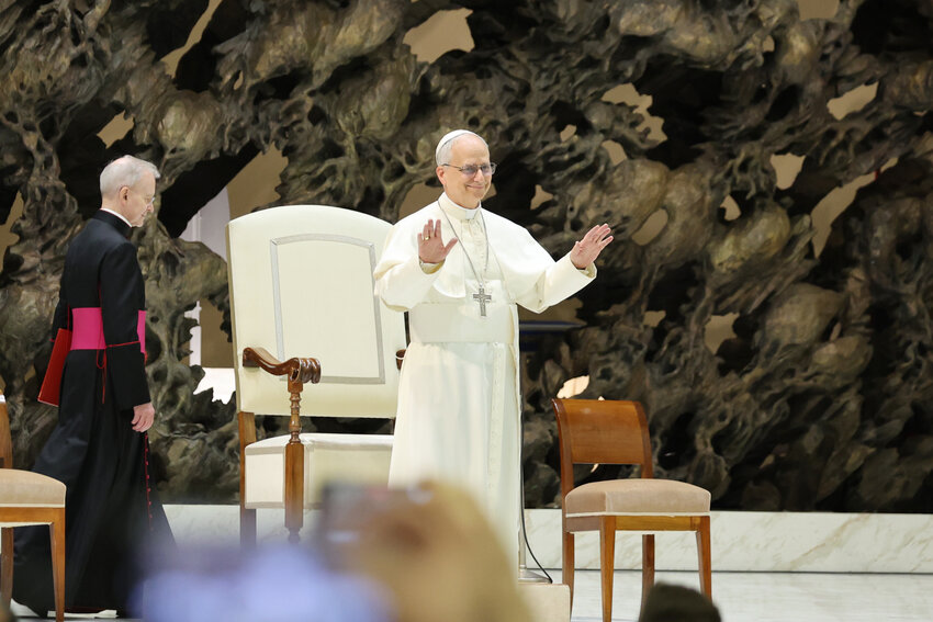 Pope Leo XIV greets members of the world press during a special papal audience for members of the media at the Paul VI Audience Hall at the Vatican on Monday, May 12, the same day the Sistine Chapel, where the conclave to elect him was held, reopened to the public for the first time. B