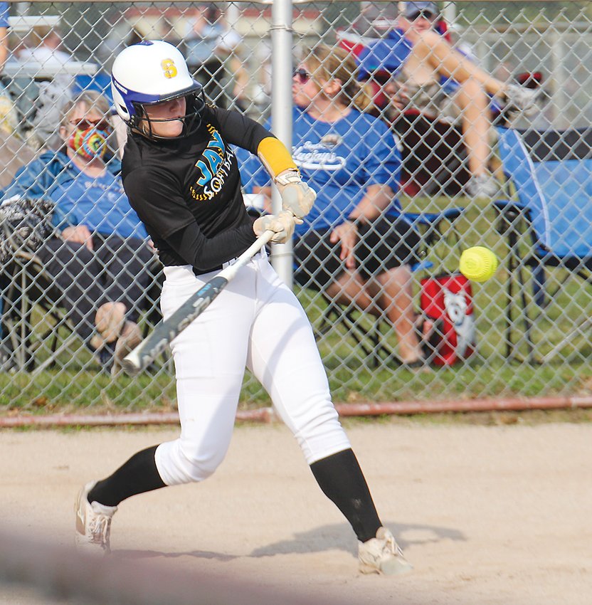 Claire Geidel of Seward swings for the fence against Aurora Sept. 26. Geidel broke the school record for home runs in a season in a game earlier in the week.