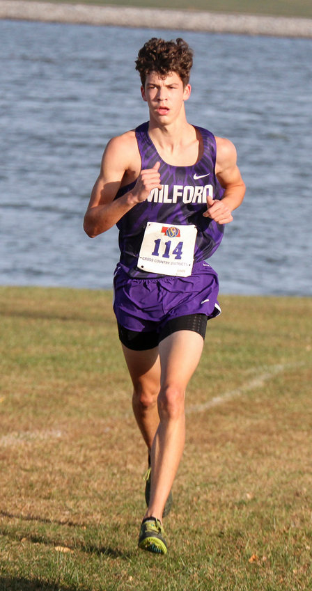 Maddox Baack of Milford keeps his pace at Branched Oak Lake during the district meet Oct. 15.