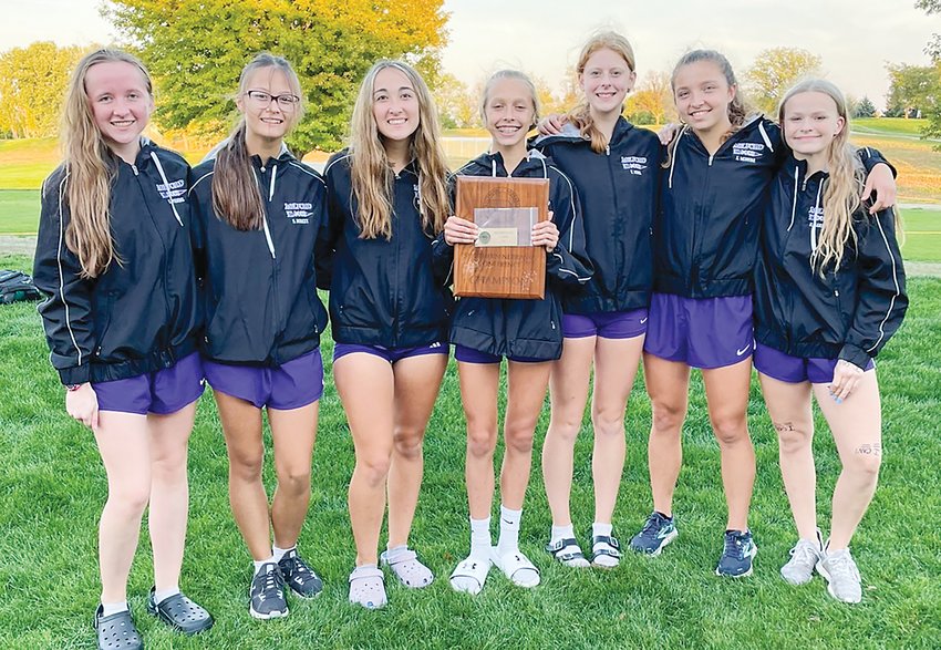 The Milford girls' team won the Southern Nebraska Conference cross country meet Oct. 7. Team members are, from left, Ellison Piening, Sally Burkey, Rebecca Freeman, Lilly Kenning, Victoria Mink, Eliza McGuire and Kaylee Garrison.