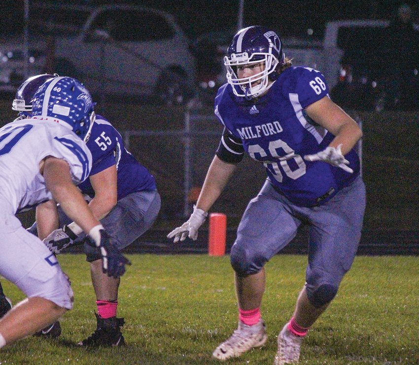 Gage Troyer of Milford moves into his defensive position following a snap against Lakeview Oct. 29.