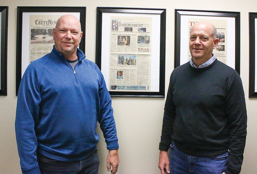 Kevin Zadina, left, purchased the Seward Independent Group from Mark Rhoades of Enterprise Publishing in Blair. The group includes the Seward County Independent, Milford Times, Crete News, Wilber Republican and Friend Sentinel.