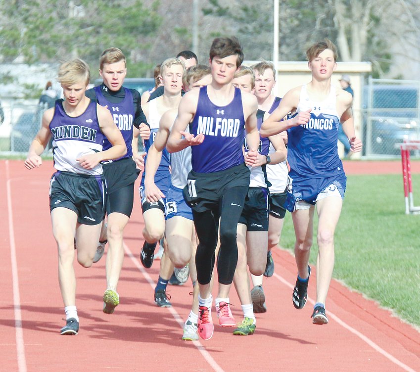 Milford's Kaleb Eickhoff leads the pack down the straightaway in the 3,200-meter run April 19 at Centennial. In the pack are Gavin Dunlap of Milford (left), Bricen Wilke of Malcolm (5), Matthew Hoops of Centennial and Clinton Turnbull of Centennial (right).