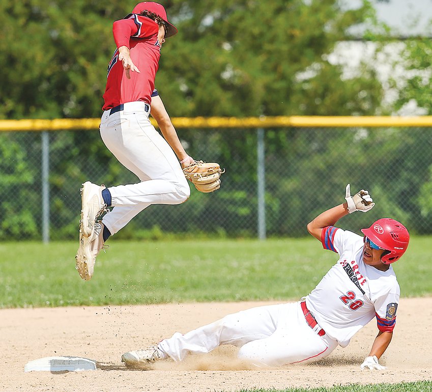 Crete's Brody Klein slides safely into second with a stolen base July 9.