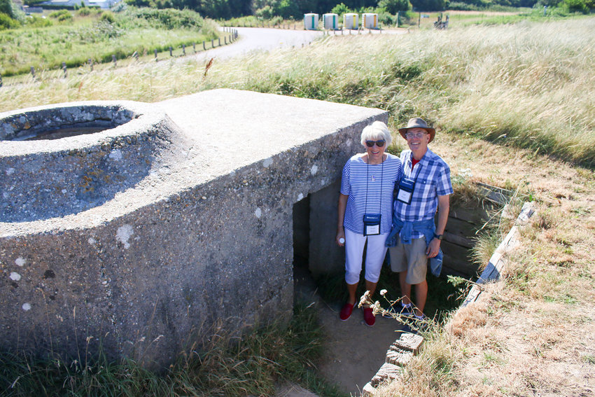 Jeff and Trudy Hines stand next to a gun emplacement off Utah Beach. Yes, that is the doorway - it's not very tall.