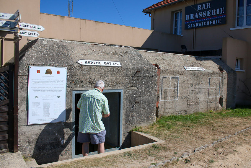 Alan Baldwin checks out Roosevelt's bunker off Utah Beach.