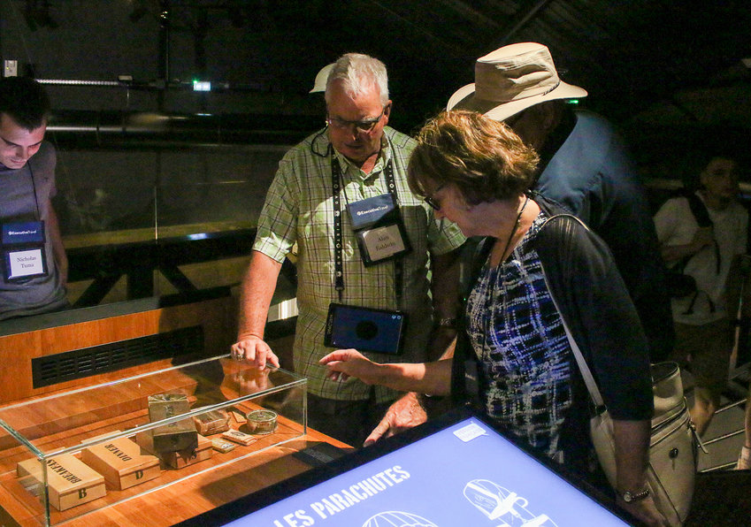 Alan and Janet Baldwin and Dave Nore discuss K Rations in the Airborne Museum.