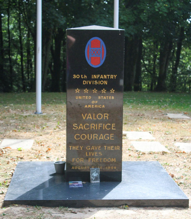 This marker at the top of Hill 314 at Mortain commemorates the 30th Infantry Division.