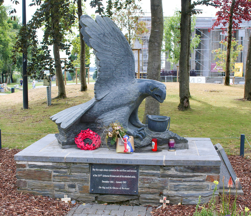 The inscription reads "May this eagle always symbolize the acrifices and heroism of the 101st Airborne Division and all its attached units. December 1944-January 1945."