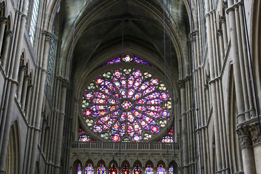 The Grande Rose window on the west end of the Reims Cathedral is one of the most famous rose windows in the world.