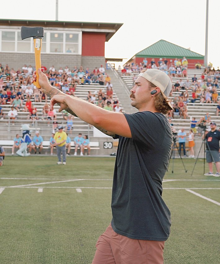 Jesse Rood lines up his throw to beat the world record axe throw at the Cornhusker State Games.