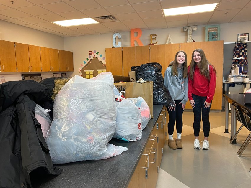 Kayla Wilken, left, and Jaycie Stutzman of Milford held a winter gear drive to donate to Voices of Hope in Lincoln as part of their STAR project.
